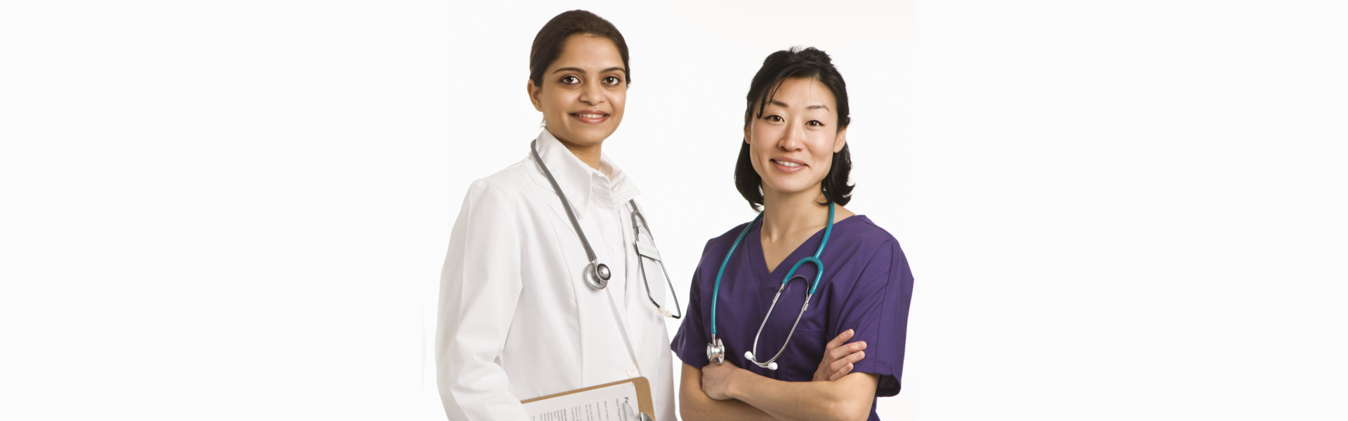 a couple of women wearing medical scrubs
